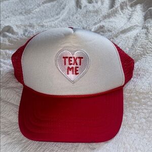 Red and white heart patch trucker hat